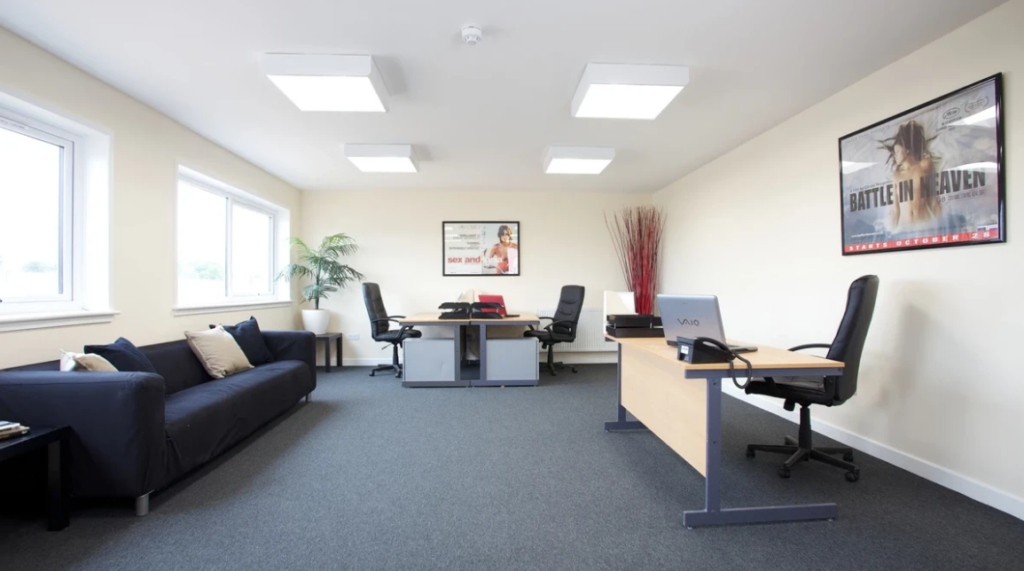 Production office with desks and a sofa