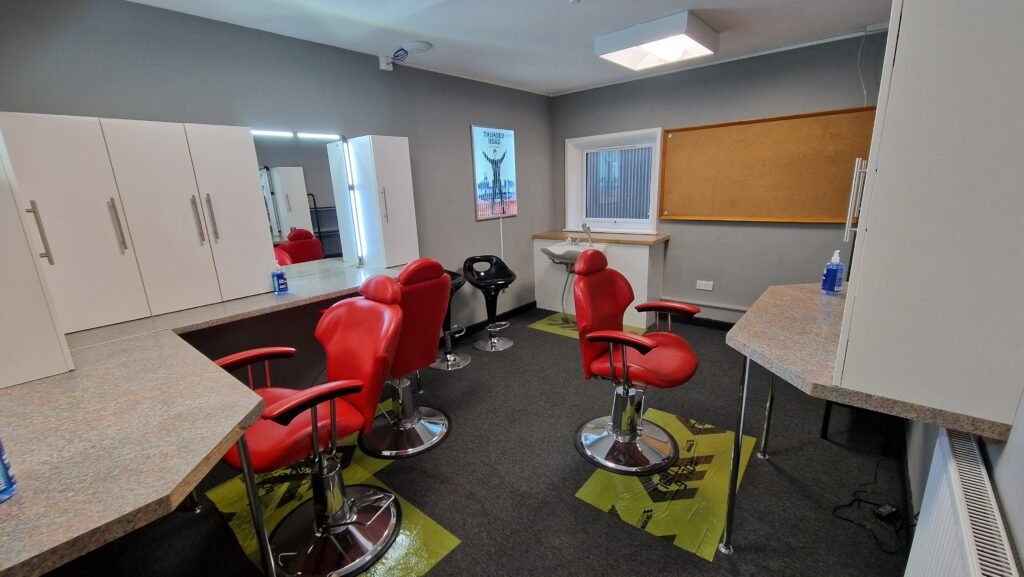 Hair and makeup room with salon chairs